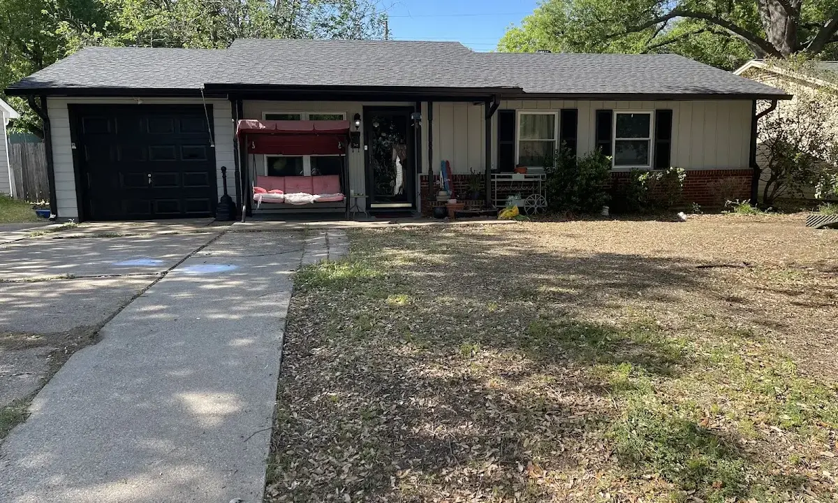 Roof Replacement crew at work on a residential roof in Prichard